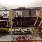The straws in this prototype run parallel to the length of the body. There are 64 in total, two groups of 32. Much of the copper cabling you can see is for grounding purpose, since we're dealing with high voltages.