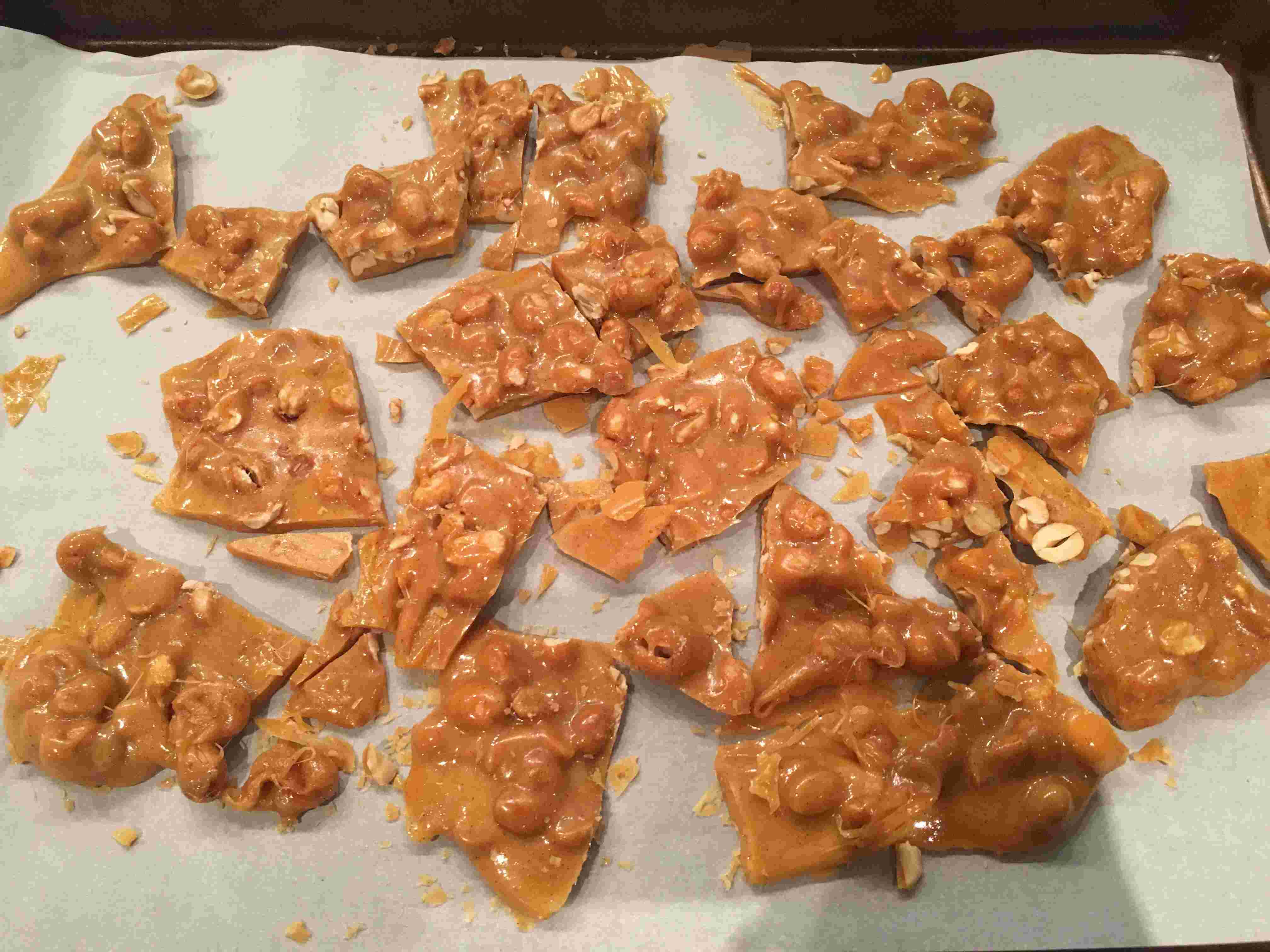 Once brittle has cooled, break it up into pieces. Save half the brittle for snacking, then pulverize the other half with peanut butter to create that crackly, slightly crunchy filling